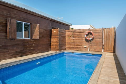 Property building, Living room, Swimming pool