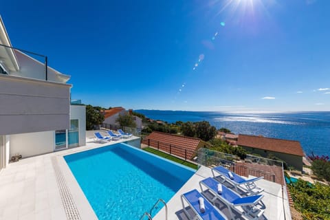 Natural landscape, View (from property/room), Pool view, Sea view, Swimming pool, sunbed