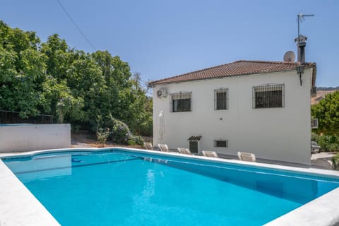 Property building, Living room, Swimming pool