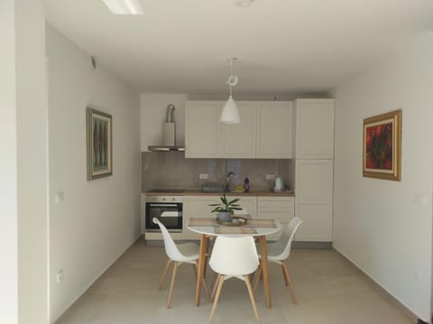 Dining area, stove, kitchen