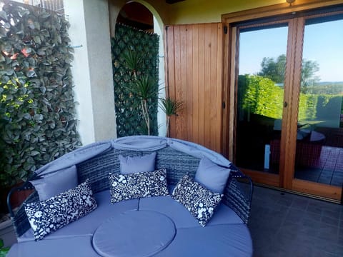 Red villa with shared pool and private garden is the new black on Lake Garda Resort in Province of Brescia