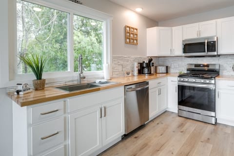 Hot Tub + Games! Lakefront Traverse City Retreat House in Bass Lake