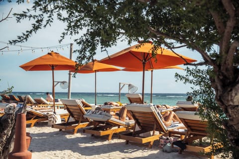Private beach, white sand, sun loungers, beach umbrellas