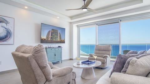 Wall mounted TV at the entertainment center, inside are fun family games.