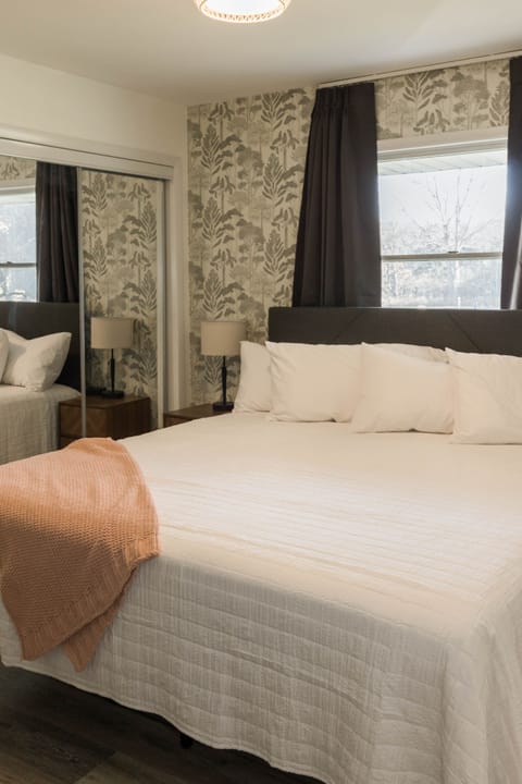 Tree bedroom on 1st floor with king bed.  Additional bedding in closet.