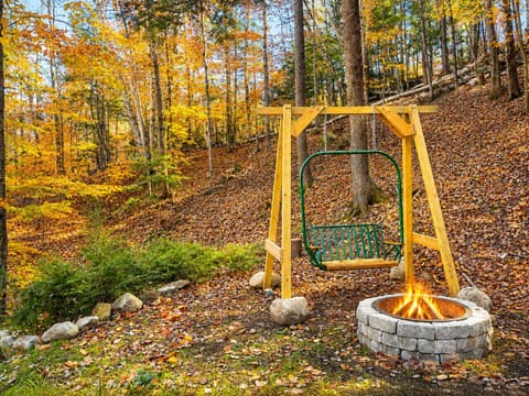 Enjoy our ski lift swing by a nice fire