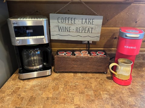 2 coffee makers: drip (reusable, metal filter) & cup (K* brand). Grinder too.