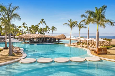 9 outdoor pools, open 9:00 AM to 9:00 PM, free cabanas, pool umbrellas