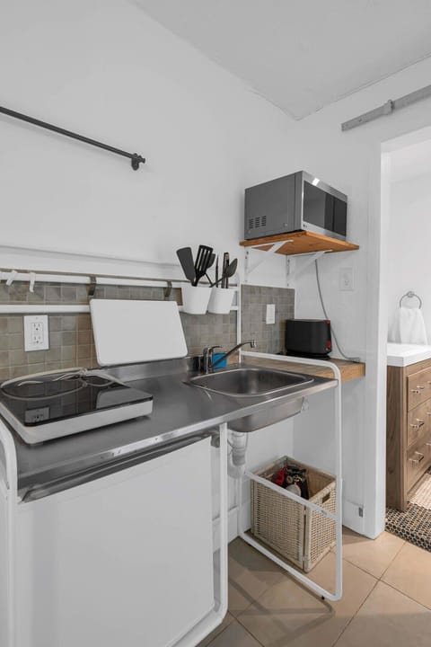 Separate kitchen space for the studio unit within the unit