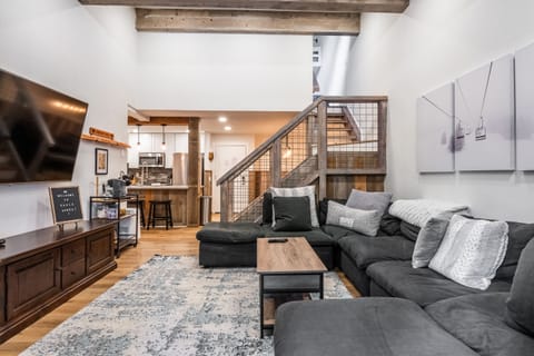 Living Room - TV, Gas Fireplace, Couch, Deck