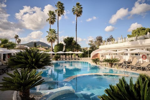 Indoor pool, outdoor pool, pool umbrellas, sun loungers