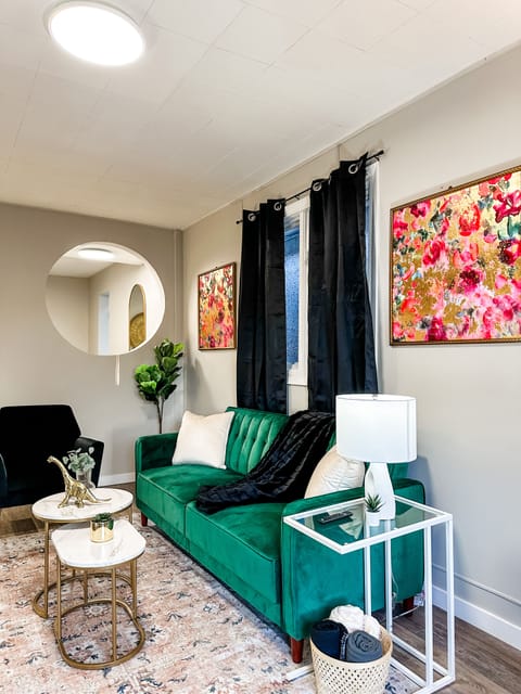 The stunning living room with pops of green!