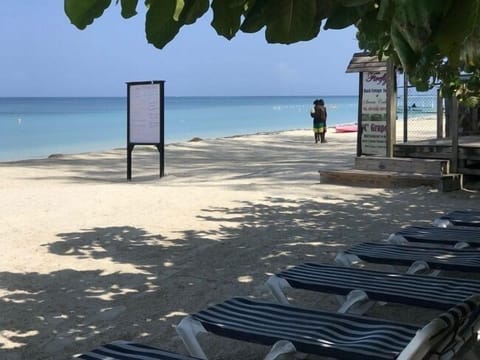 Private beach, white sand, beach towels, beach massages