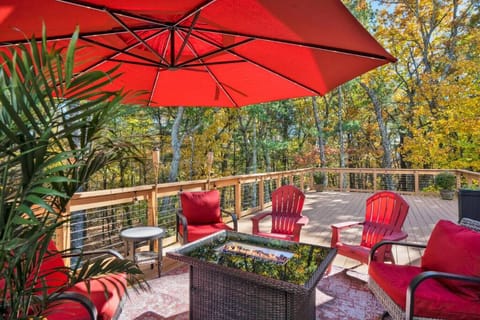Backdeck patio featuring a firepit table for warmth and ambiance