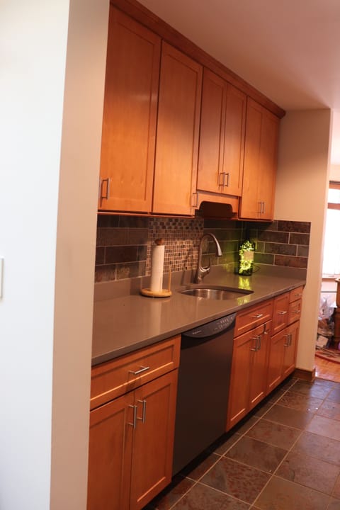 Galley kitchen fully stocked
