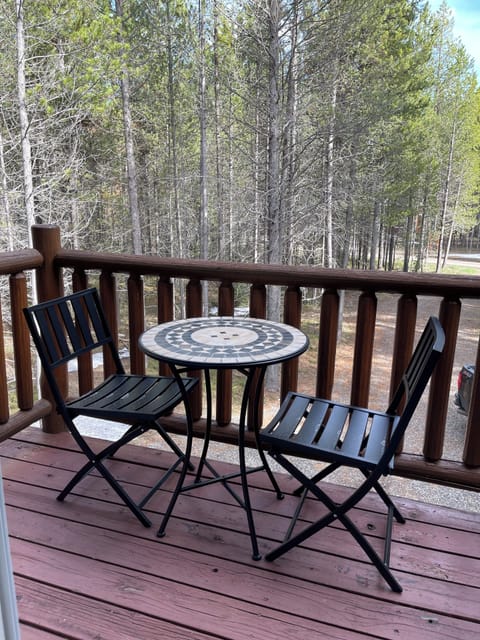 The bistro set on the balcony is the perfect place to  the outdoors!