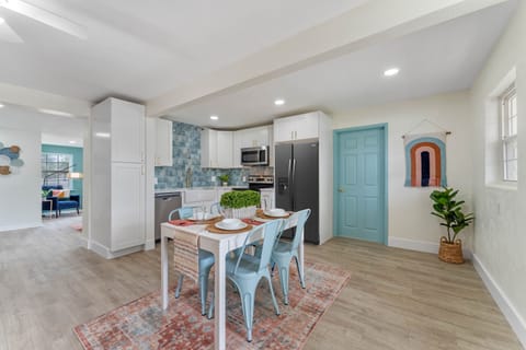 Kitchen & Dining room: The open kitchen design has plenty of room to prepare meals. The perfect place to entertain family and friends. REFRIGERATOR INCLUDED but was not delivered prior to picture day.
