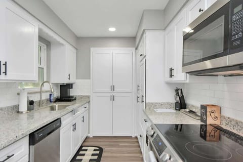 Welcome to the kitchen! This space is perfect for creating delicious memories. It comes with new stainless appliances, dishes, cups, utensils, pots & pans, & a Keurig... perfect for your favorite morning cup of coffee. 