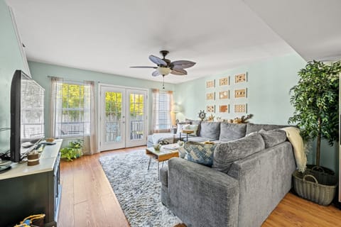 The private patio off the main living room invites you to step outdoors.