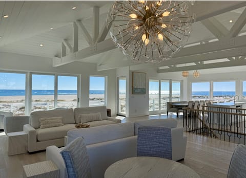 Spacious great room with panoramic ocean & sound views, opens to deck. Seats 34+