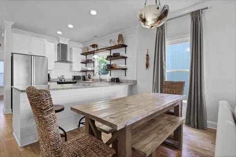 Plenty of seating in the dining room and at the kitchen bar