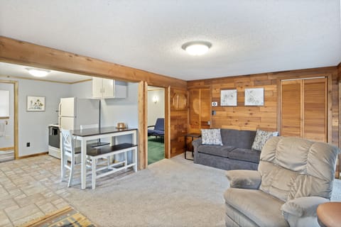 Living room with open access to the kitchen