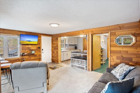 The bedroom is also accessible from the living room