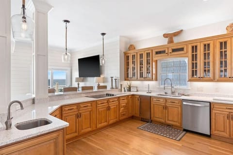 Never miss any of the action on TV as you cook your meals - there's a direct view of the TV from the kitchen.