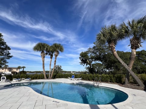 1 of 2 pools in community. Visible from condo