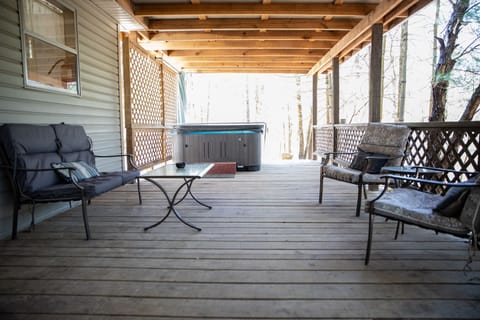Covered deck with hot tub
