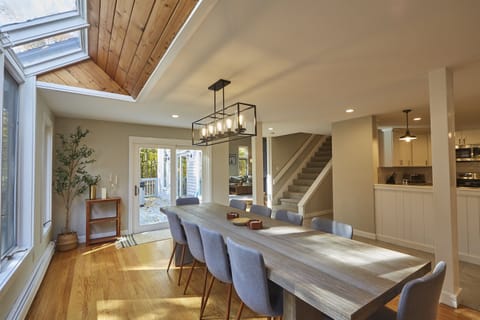 Cozy up by the warm, crackling fire in this modern Vermont escape. With soaring wood-beamed ceilings and an extra-large sectional, this spacious retreat is perfect for relaxing after a day of outdoor adventures.