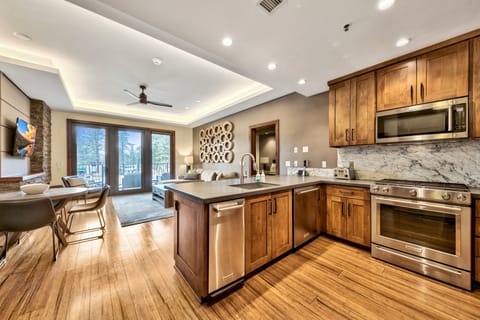 Kitchen has plenty of space and modern appliances for the chef