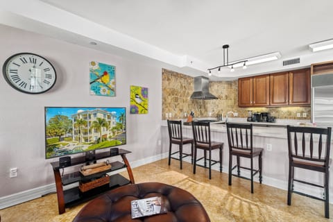 Whether you're catching a favorite show or chatting with the chef, this inviting view keeps everyone connected in style and comfort.