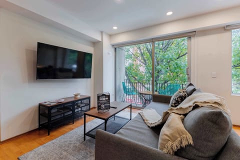 Flat-screen TV and cozy vibes await.


