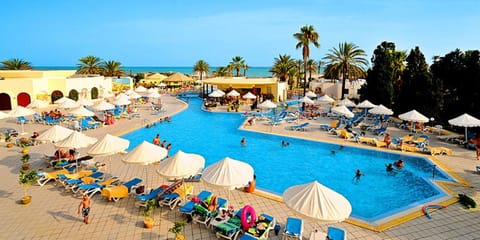 Indoor pool, outdoor pool, pool umbrellas, sun loungers