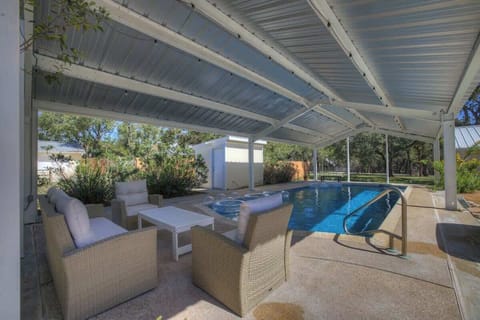 Take a dip or relax  on the cozy furniture.