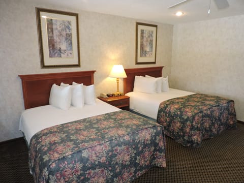 Standard Room, 2 Queen Beds, Ground Floor | Desk, laptop workspace, blackout drapes, free WiFi