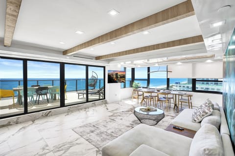 Luxury Oceanfront Condo 2BR 2.5BA with 700Sqft Terrace, Sauna, Resort Amenities & Pools 1501 | Living area | 45-inch flat-screen TV with cable channels