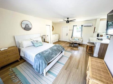 Comfy Queen Bed greeting you from a day relaxing on the beach.