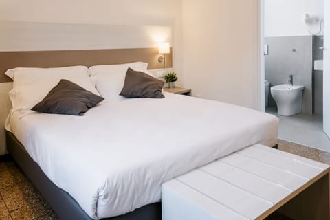 Superior Double or Twin Room | Minibar, in-room safe, desk, laptop workspace