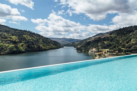Indoor pool, seasonal outdoor pool, pool umbrellas, sun loungers