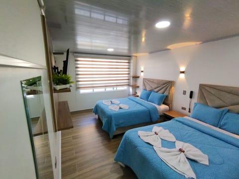 Deluxe Room, 2 Double Beds | 1 bedroom, down comforters, laptop workspace, free WiFi