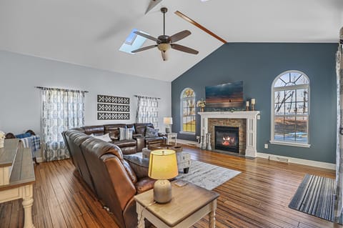Unwind by the fireplace on the huge couch.