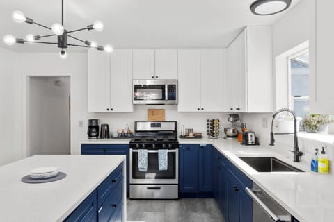 Fully equipped kitchen with SS appliances, stocked with everything you'll need. 