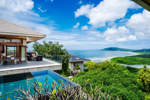 The view to Tamarindo beach from the balcony and the pool