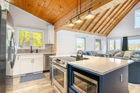 You will love the stone counters, stainless appliances, and open floor plan