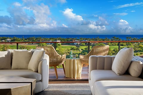 Relax on our lanai, embraced by ocean views that stretch to the horizon, blending comfort with the beauty of the sea.