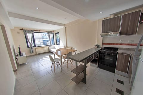 Family Apartment | Living area | 50-inch Smart TV with cable channels