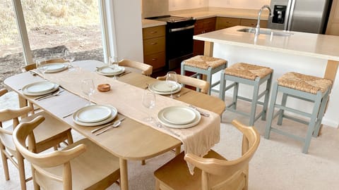 Stoneware oak table settings and beautiful glassware to enjoy your meals