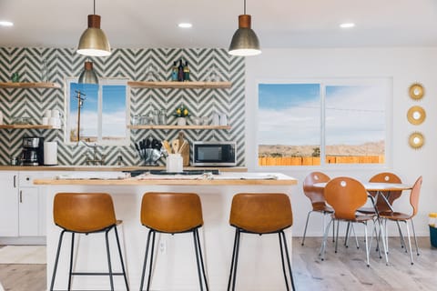 Island seating and indoor dining space